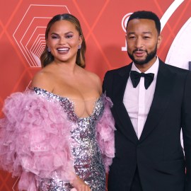 Chrissy Teigen, left, and John Legend arrive at the 74th annual Tony Awards at Winter Garden Theatre on Sunday, Sept. 26, 2021, in New York. (Photo by Evan Agostini/Invision/AP)