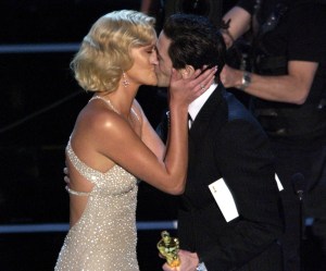 Charlize Theron kisses Adrien Brody for her win as Best Actress for "Monster" (Photo by M. Caulfield/WireImage)