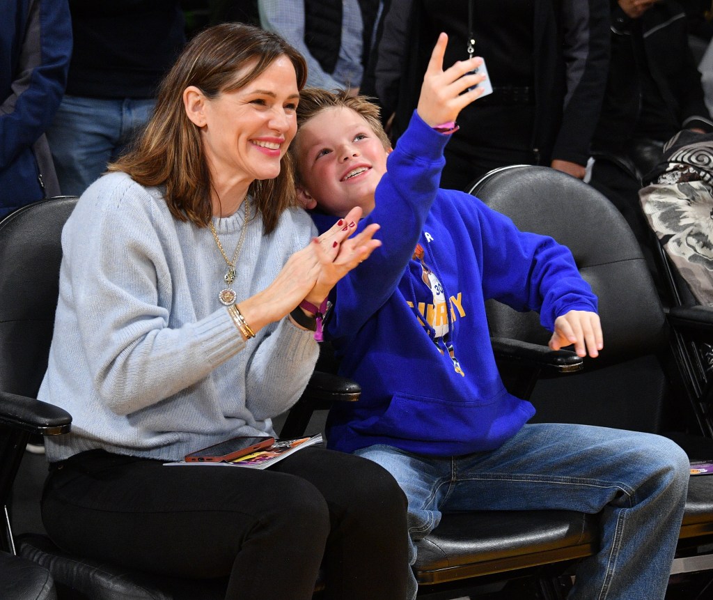 LOS ANGELES, CALIFORNIA - MARCH 05: Jennifer Garner and her son Samuel Garner Affleck attend a basketball game between the Los Angeles Lakers and the Golden State Warriors at Crypto.com Arena on March 05, 2023 in Los Angeles, California. NOTE TO USER: User expressly acknowledges and agrees that,  by downloading and or using this photograph,  User is consenting to the terms and conditions of the Getty Images License Agreement. (Photo by Allen Berezovsky/Getty Images)