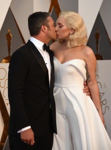 HOLLYWOOD, CA - FEBRUARY 28:  Actor Taylor Kinney (L) and singer Lady Gaga attend the 88th Annual Academy Awards at Hollywood & Highland Center on February 28, 2016 in Hollywood, California.  (Photo by Jason Merritt/Getty Images)